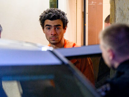 Suspected shooter Luigi Mangione is led from the Blair County Courthouse after an extradit