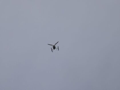 GAZA CITY, GAZA - DECEMBER 11: A drone is seen after an attack by the Israeli army on a bu