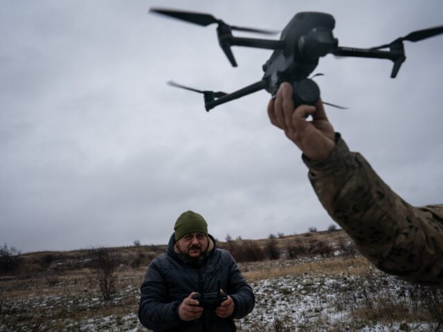 DONETSK, UKRAINE - DECEMBER 15: Ukrainian servicemen of 24th brigade are seen using drones