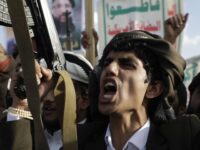 A Houthi supporter shouts slogans during an Anti- U.S and Israel rally in Sanaa, Yemen, Fr