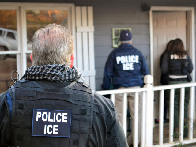 In this Feb. 9, 2017, photo provided U.S. Immigration and Customs Enforcement, ICE agents