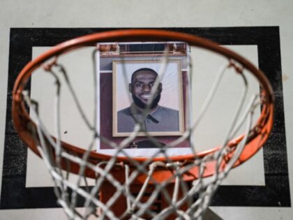 WAN CHAI, HONG KONG - 2019/10/15: Picture of Lebron James stuck on the hoop during the dem