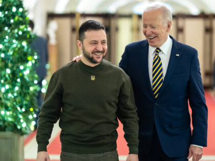 President Joe Biden walks with Ukrainian President Volodymyr Zelenskyy, Wednesday, Decembe