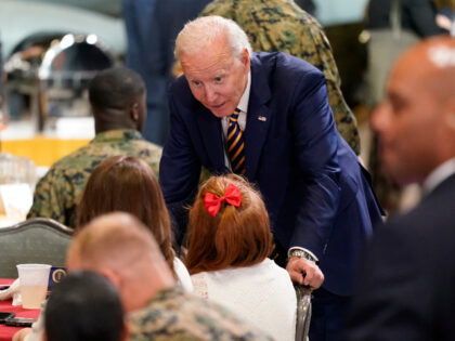 President Joe Biden talks to guests at Marine Corps Air Station Cherry Point in Havelock,