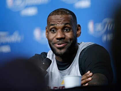 Cleveland Cavaliers' LeBron James answers a question during a media availability at Quicke