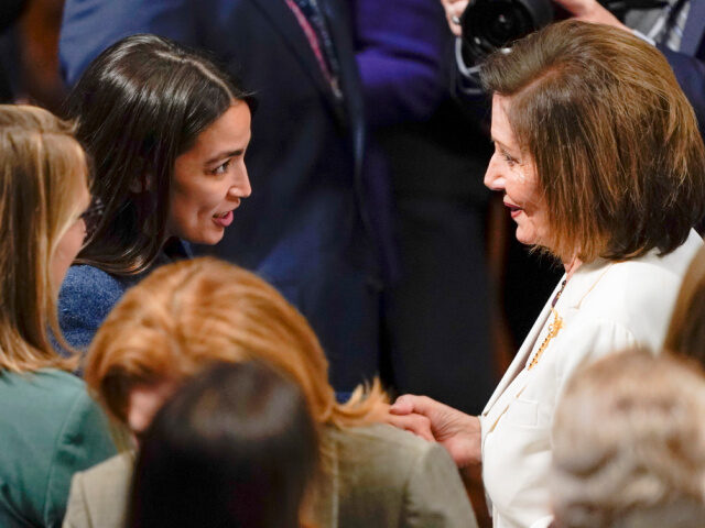 House Speaker Nancy Pelosi of Calif., talks with Rep. Alexandria Ocasio-Cortez, D-N.Y., af