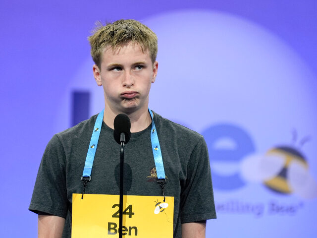 Benjamin Evans, 9, of Poway, Calif., reacts during the semifinals of the Scripps National