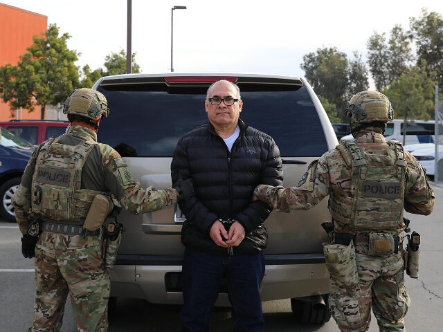 Federal authorities prepare to deport Gulf Cartel Boss Osiel Cardenas. (Credit: U.S. ICER-