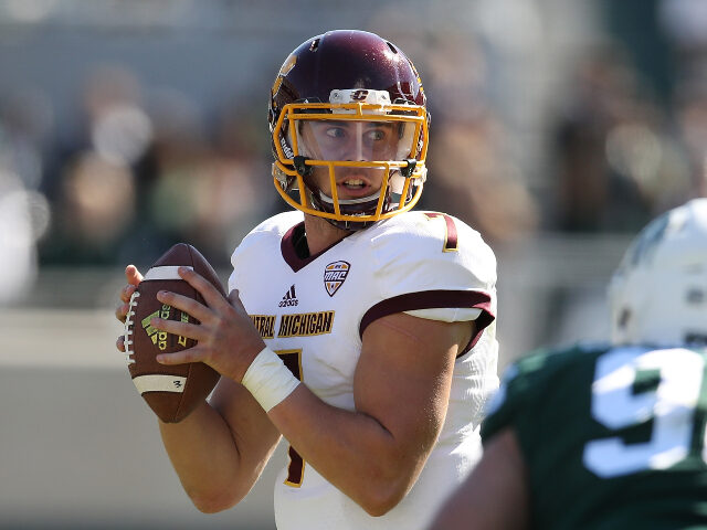 Tommy Lazzaro #7 of the Central Michigan Chippewas throws a second half pass while playign