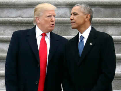 FILE - In this Friday, Jan. 20, 2017, file photo, President Donald Trump talks with former