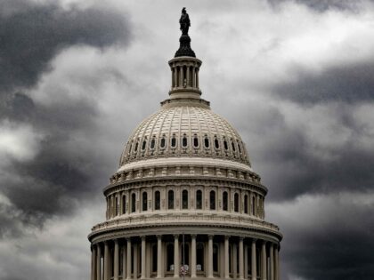 Storm clouds pass over the US Capitol in Washington, DC, on January 23, 2023. (Photo by JI