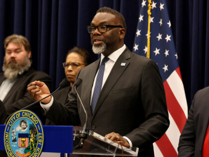 Chicago Mayor Brandon Johnson answers questions from reporters following a City Council me