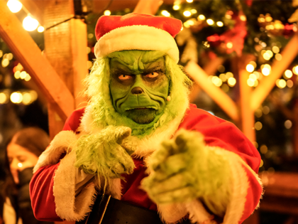 An actor dressed as the Grinch at a Christmas funfair on December 6, 2024, in Herne, Germa