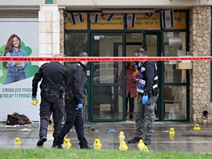 Israeli police check the scene of a stabbing attack in Herzliya, north of Tel Aviv, on Dec