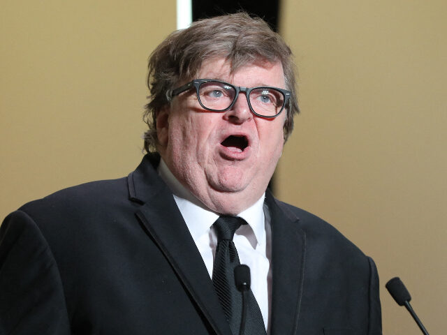 US Michael Moore delivers a speech on stage before awarding the Jury Prize on May 25, 2019