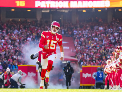 KANSAS CITY, MO - DECEMBER 21: Patrick Mahomes #15 of the Kansas City Chiefs runs out of t