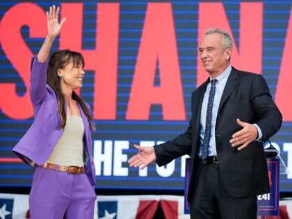 Presidential candidate Robert F. Kennedy Jr. right, stands on stage with Nicole Shanahan,