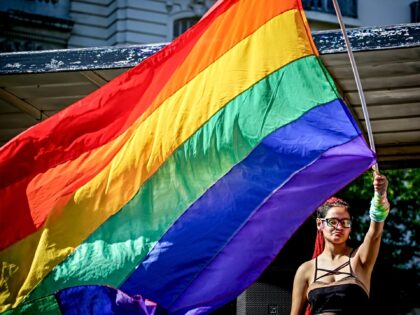 BUENOS AIRES, ARGENTINA - 2023/11/04: An attendee waves a giant pride flag during the Arge