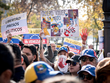 MADRID, SPAIN - 2024/12/01: Protesters hold placards expressing their opinion during the d