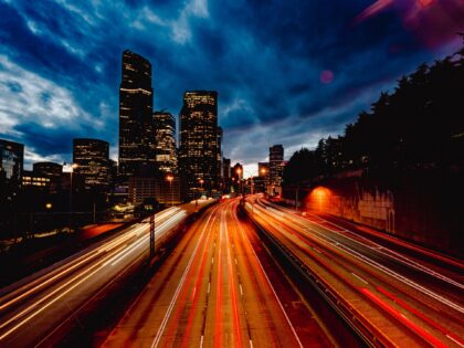 MAY 2024, SEATTLE, WASHINGTON, USA - streaked car lights off Interstate 5 leading into dow