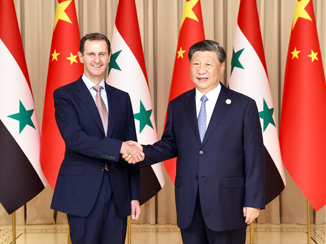 Chinese President Xi Jinping meets with Syrian President Bashar al-Assad in Hangzhou, capi