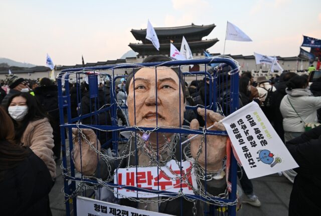 An effigy of South Korea's impeached President Yoon Suk Yeol at a rally calling for his ou