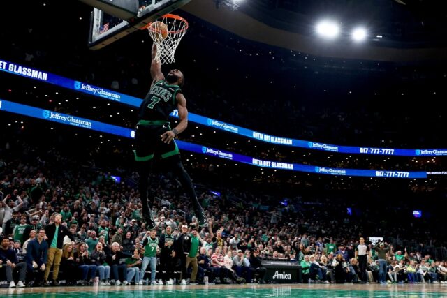 Boston's Jaylen Brown throws down a dunk in the Celtics' NBA victory over the Indiana Pace