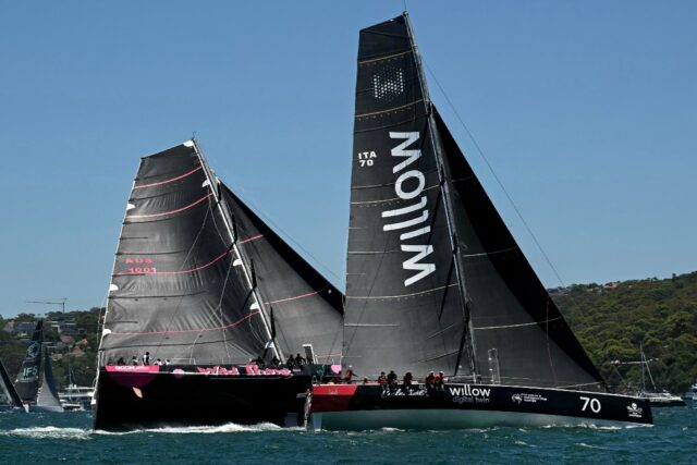 Celestial V70 (right) at the start of the Sydney to Hobart yacht race on December 26