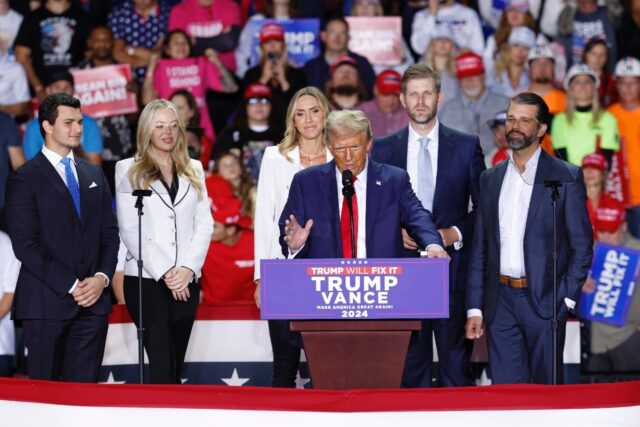 Donald Trump (C), appointed the father of Tiffany Trump's (2nd L) spouse Michael Boulos (f