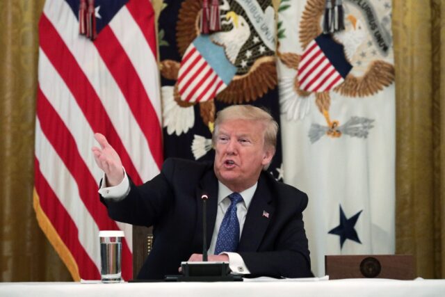 Donald Trump, pictured at a cabinet meeting in his first term, has surrounded himself with