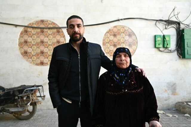 Freed Syrian prisoner Ghazi Mohammed al-Mohammed, 39, with his mother Fatima Abd al-Ghany