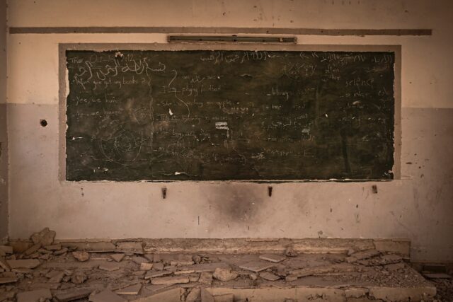 The last lesson in this Yarmuk elementary school is still on the board, 12 years after the