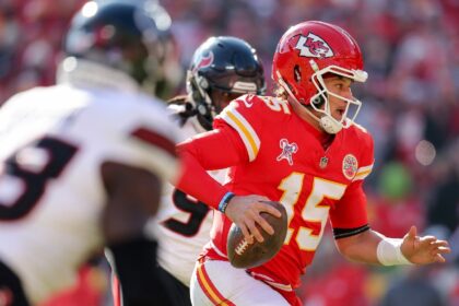 Patrick Mahomes of the Kansas City Chiefs scrambles for a rushing touchdown in an NFL vict