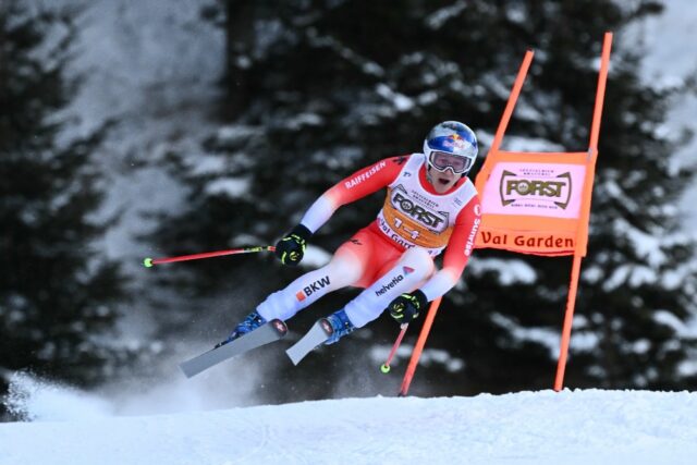 Swiss Marco Odermatt on his way to victory in the World Cup downhill at Val Gardena, Italy