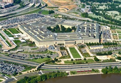 Talks over the 1,800-page-plus Pentagon bill were complicated by a row over gender-affirmi