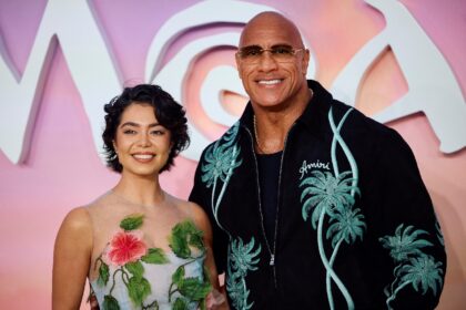 US actors Auli'i Cravalho (L) and Dwayne Johnson pose on the red carpet at the UK premier