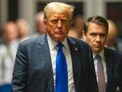 Former President Donald Trump walks outside of Manhattan Criminal Court after a jury convi