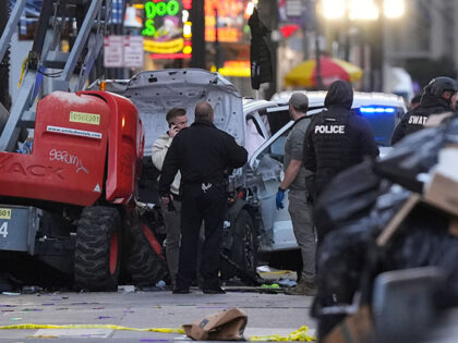 Emergency services attend the scene on Bourbon Street after a vehicle drove into a crowd o