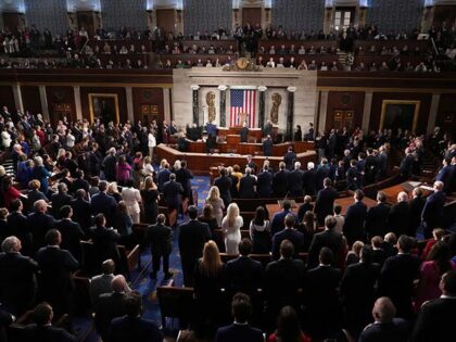 Members recite the Pledge of Allegiance as the House of Representatives meets to elect a s