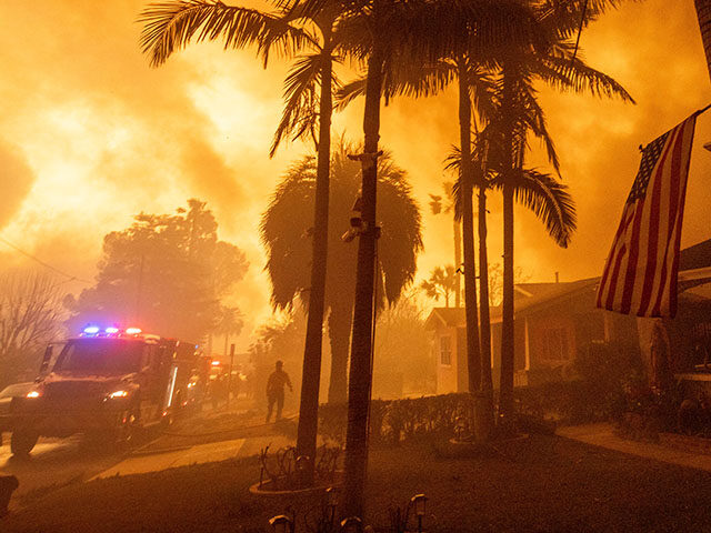 Fire crews battle the Eaton Fire Wednesday, Jan. 8, 2025 in Altadena, Calif. (AP Photo/Eth