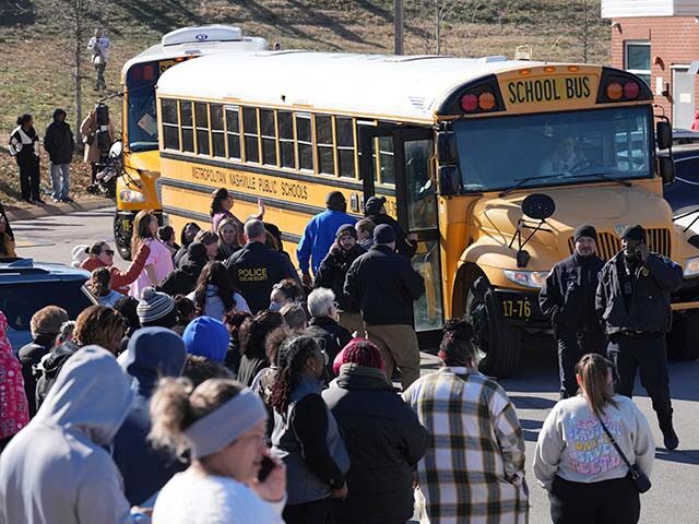 School bus arrives at a unification site following a shooting at at Antioch High School in