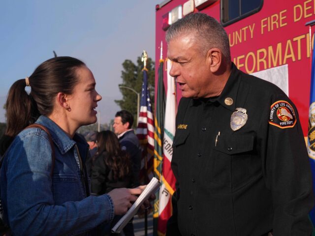 PASADENA, CALIFORNIA - JANUARY 09: Los Angeles Times reporter Grace Toohey (left) intervie