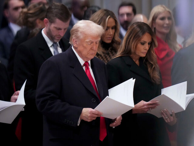 US President Donald Trump, left, and First Lady Melania Trump attend the Nation Prayer Ser