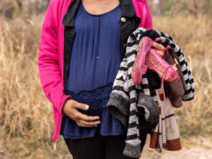 MISSION, TEXAS - MARCH 23: An asylum seeker from Honduras, traveling with her three childr