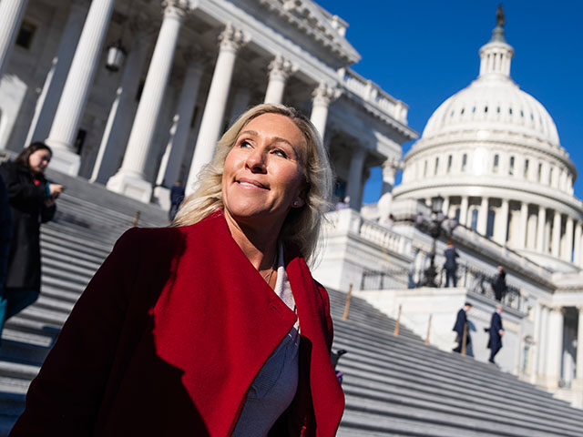 Rep. Marjorie Taylor Greene, R-Ga., talks with reporters outside the U.S. Capitol during t