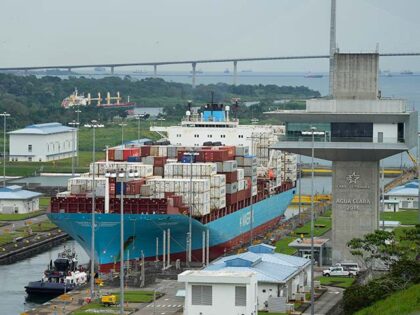 The Danish cargo ship Lars Maersk sails through the Agua Clara Locks of the Panama Canal i