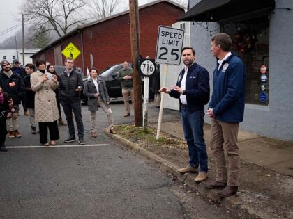 US Vice President JD Vance (L) and Virginia Governor Glenn Youngkin speak to the press out