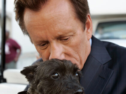 Actor James Woods with his dog Angel, on the Fox Studios lot where they are taping Shark,