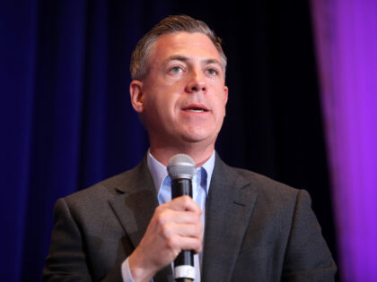 U.S. Congressman Jim Banks speaking with attendees at the Republican Jewish Coalition&#039