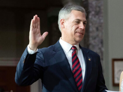 Vice President Kamala Harris, right, holds a ceremonial swearing-in for Sen. Jim Banks, R-